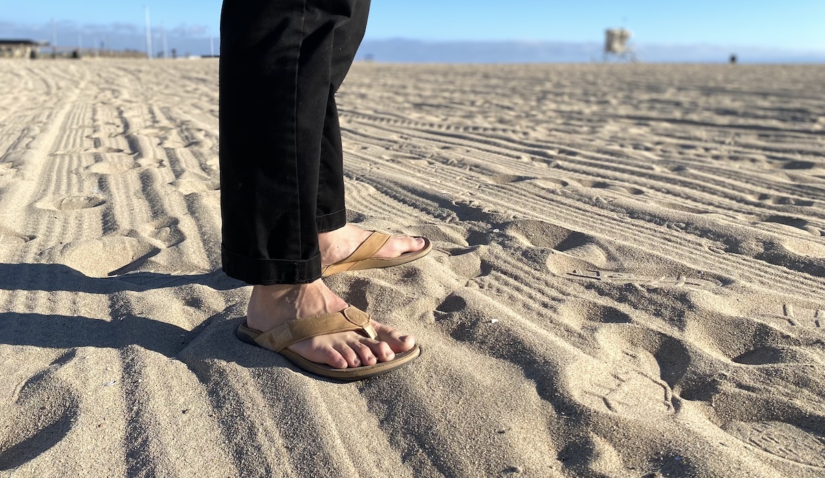 Olukai Tuahine sandals on the beach