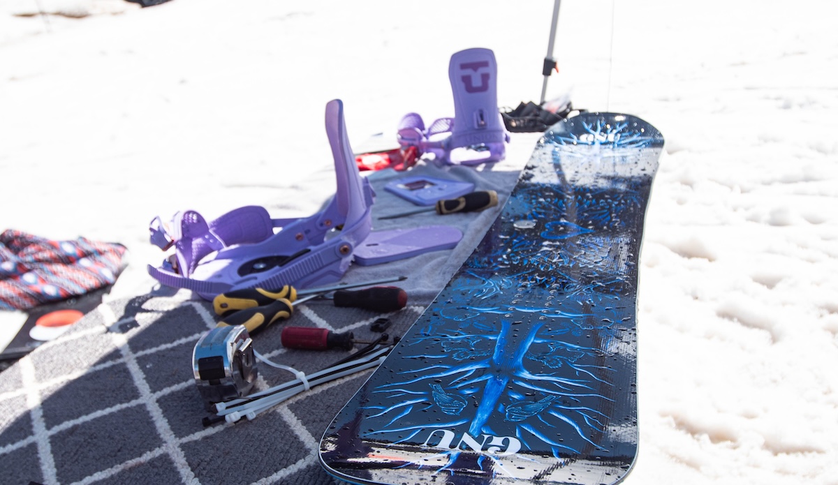 setting up a gnu snowboard for testing at Aspen Mountain