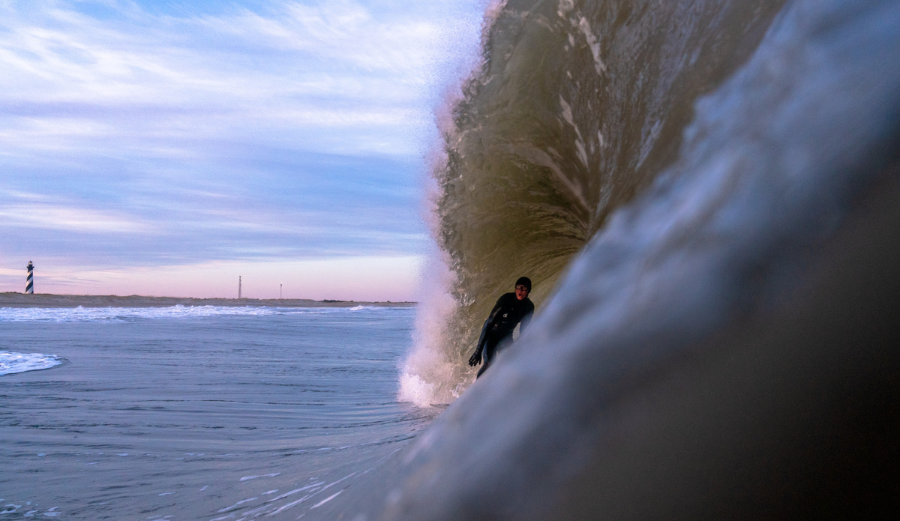 Kai Wescott gets barreled at the Cape Hatteras Lighthouse. Photo: Cody Hammer