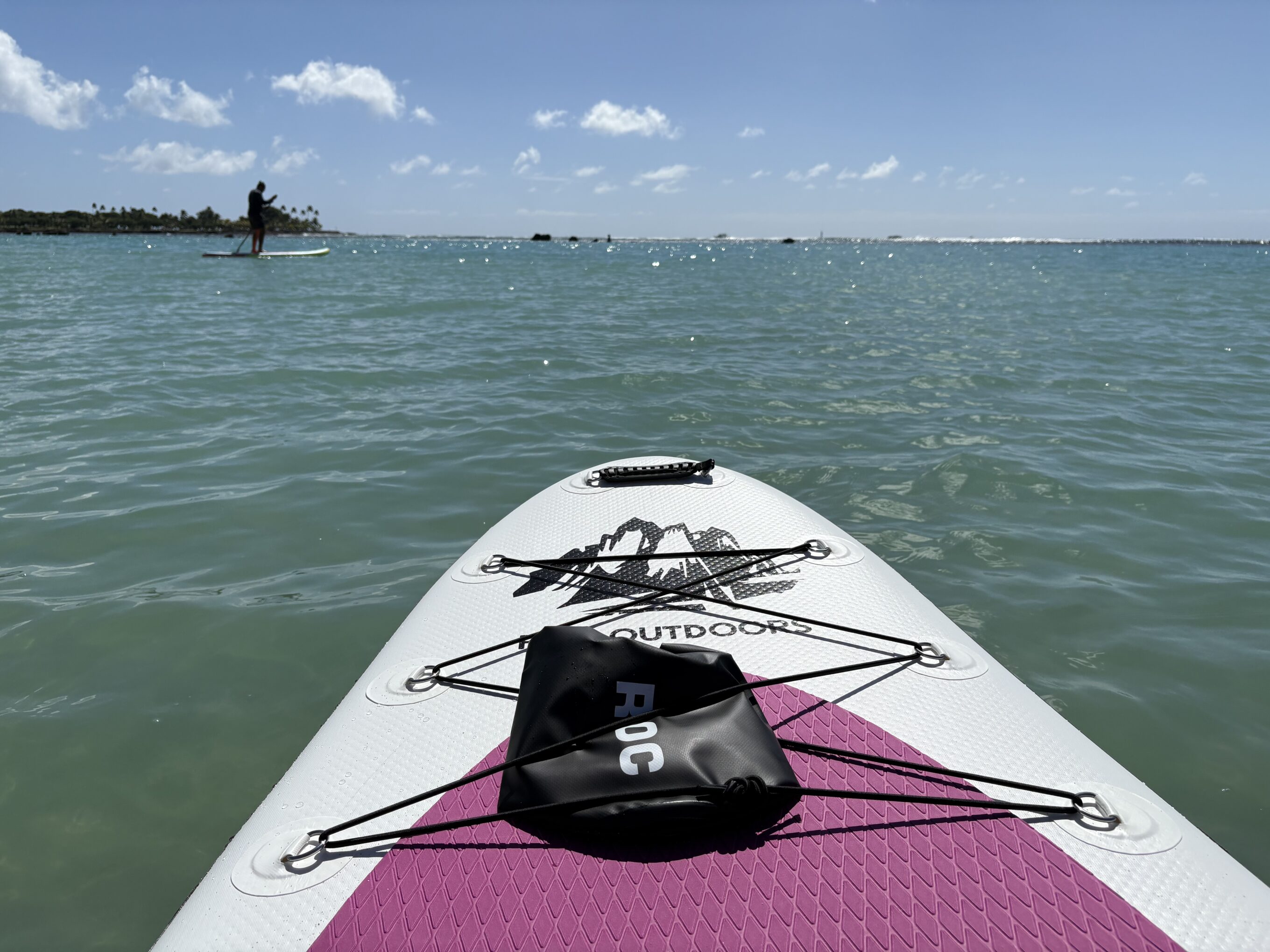 front of an inflatable paddle baord