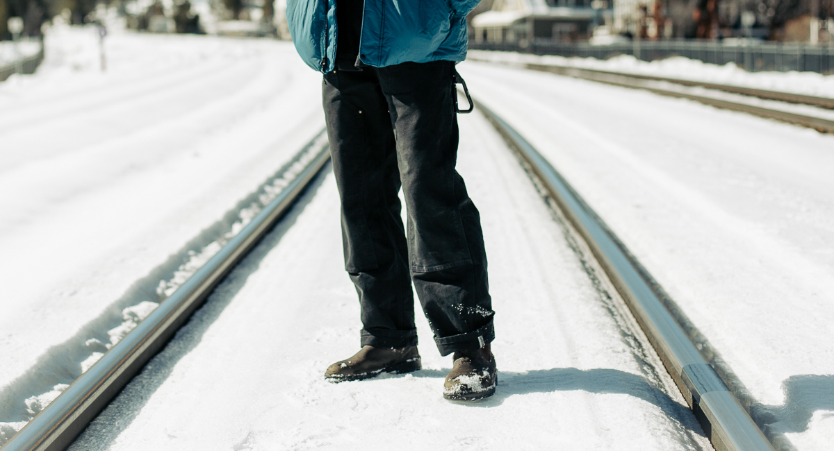 man standing in snow