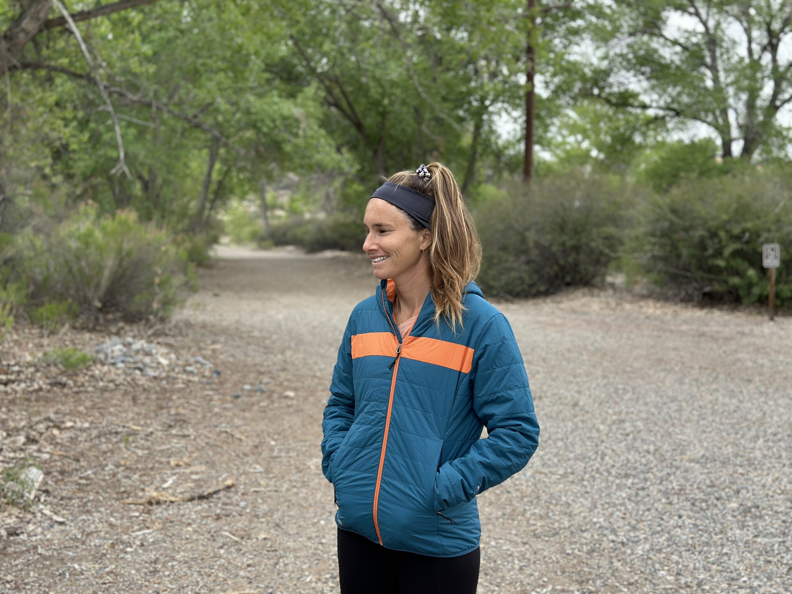 a woman wearing a puffer ibex jackiet