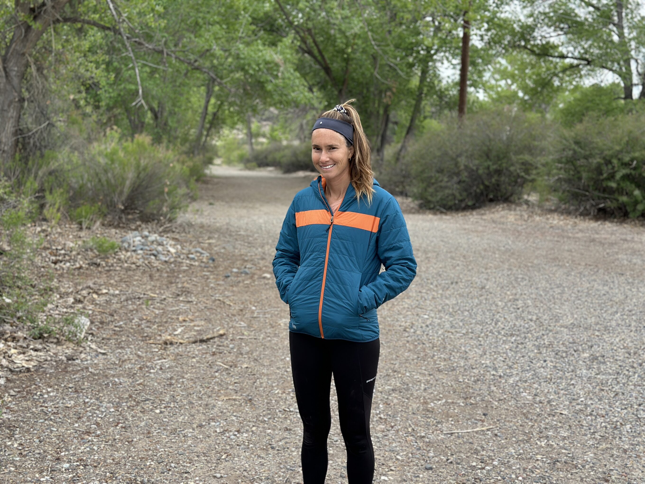a woman in an ibex puffer jacket