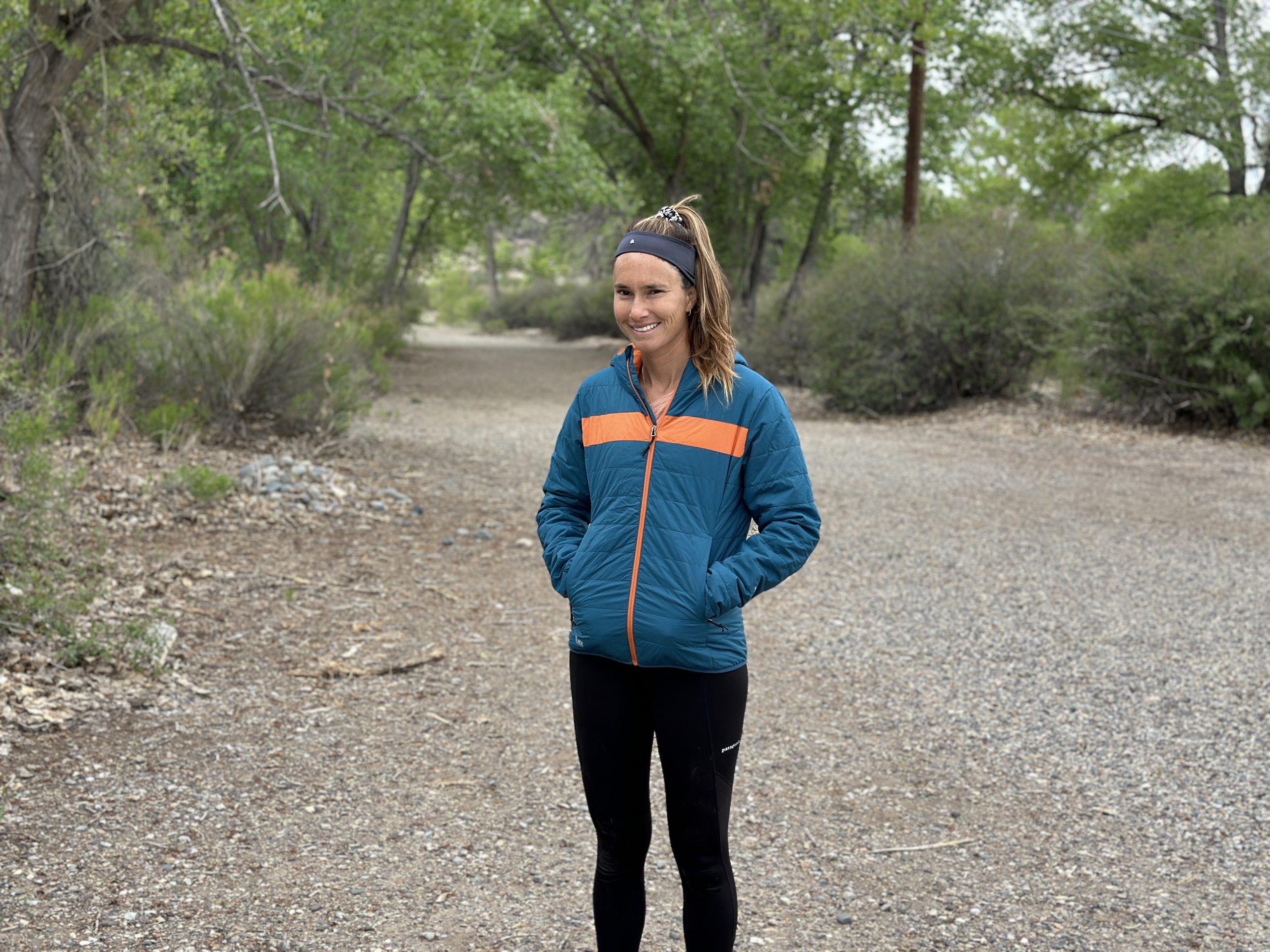 a woman in an ibex puffer jacket