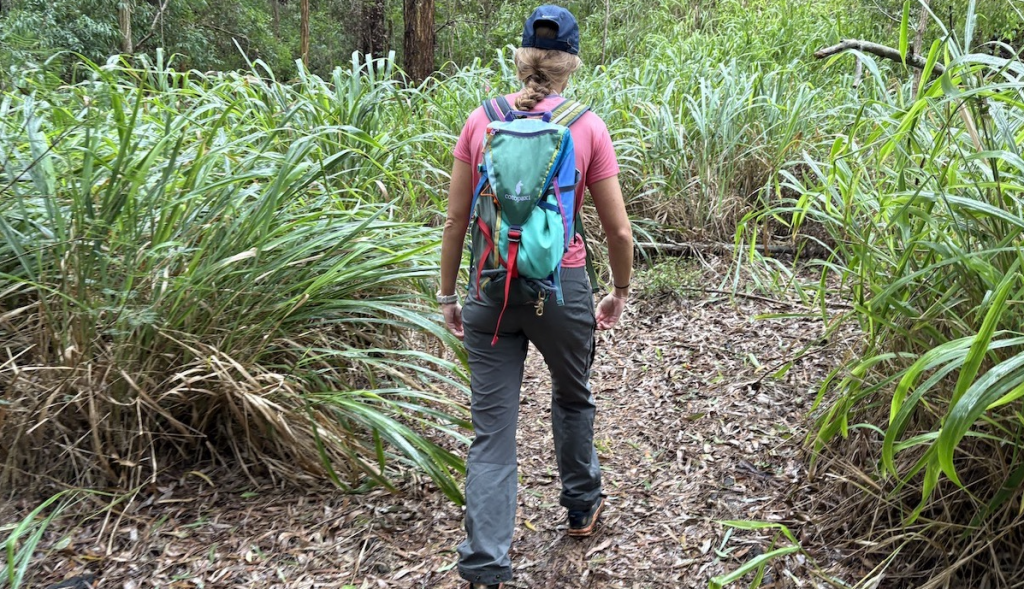 a woman hiking in hiking pants