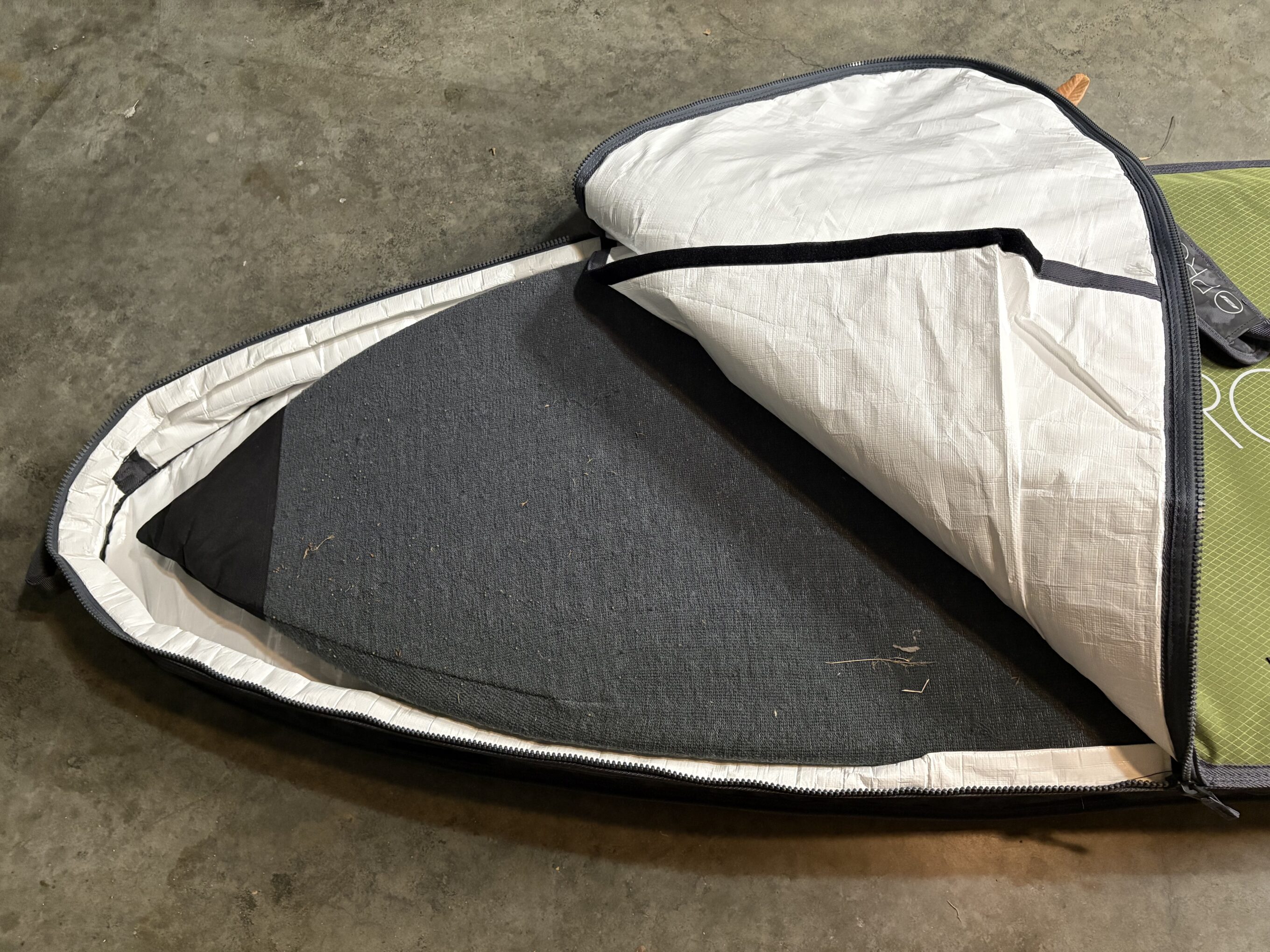 a surfboard in a board bag
