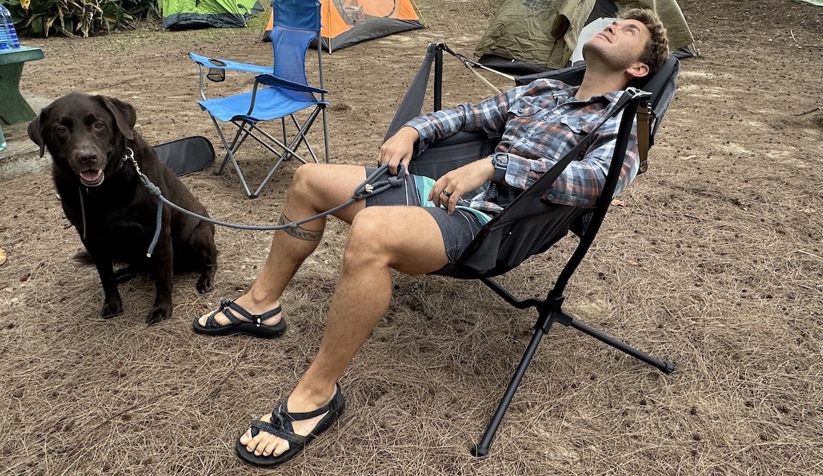 a man in the Nemo Stargazer camping chair