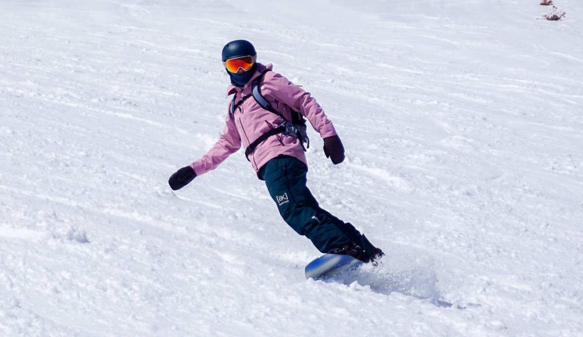 snowboarder turning toe-side