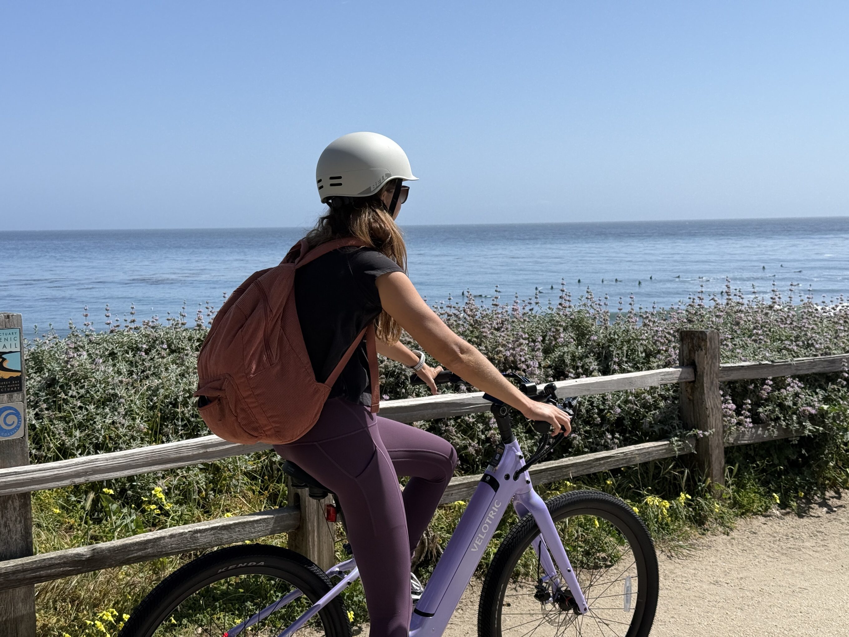 a woman on a bike