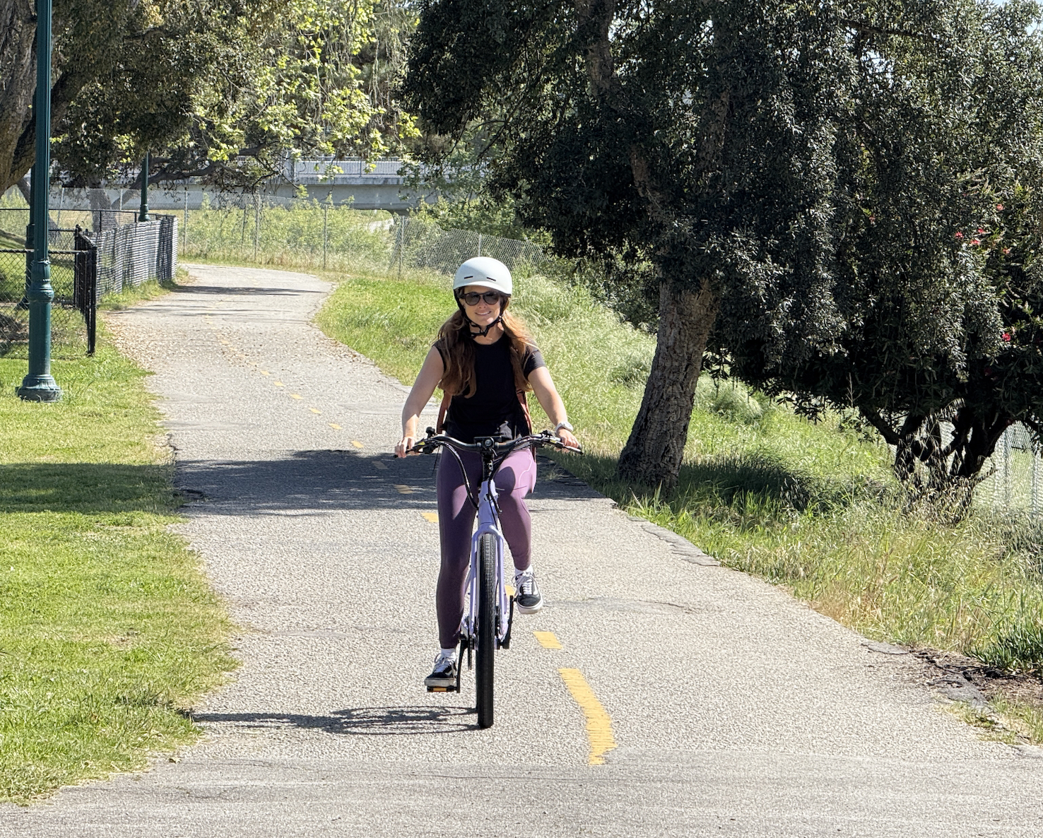 a woman riding a Breeze bike
