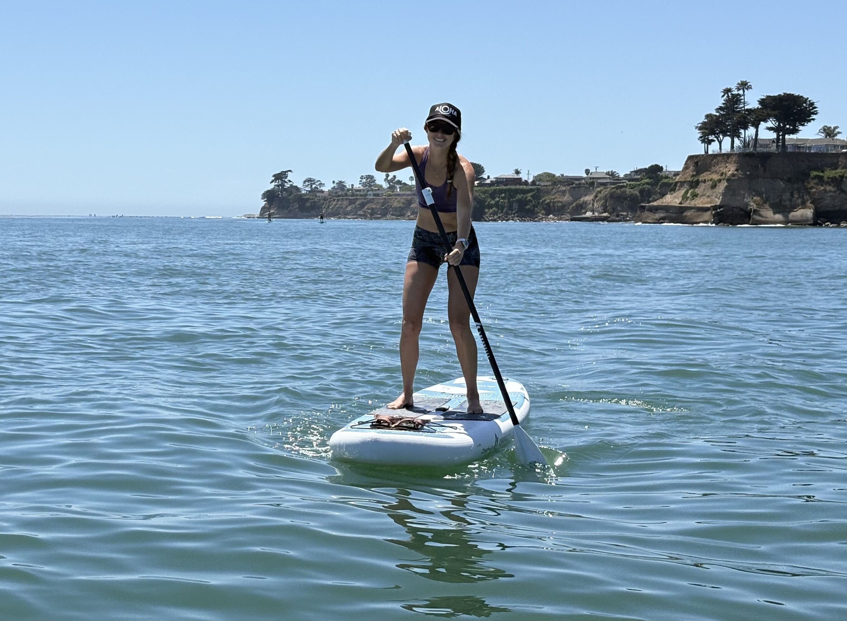 a woman paddling a Chasm-Lite in the ocean