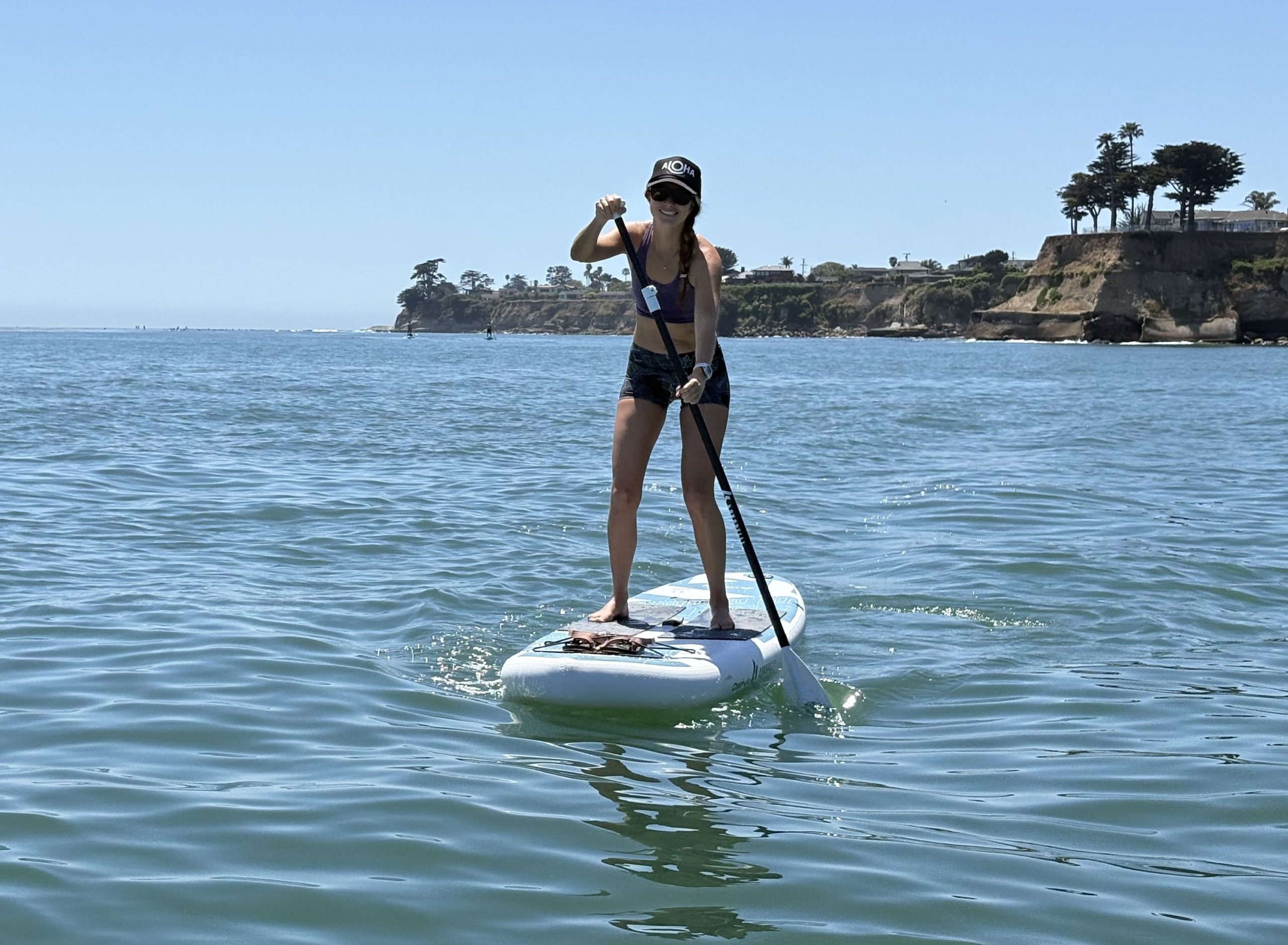 a woman paddling a Chasm-Lite in the ocean