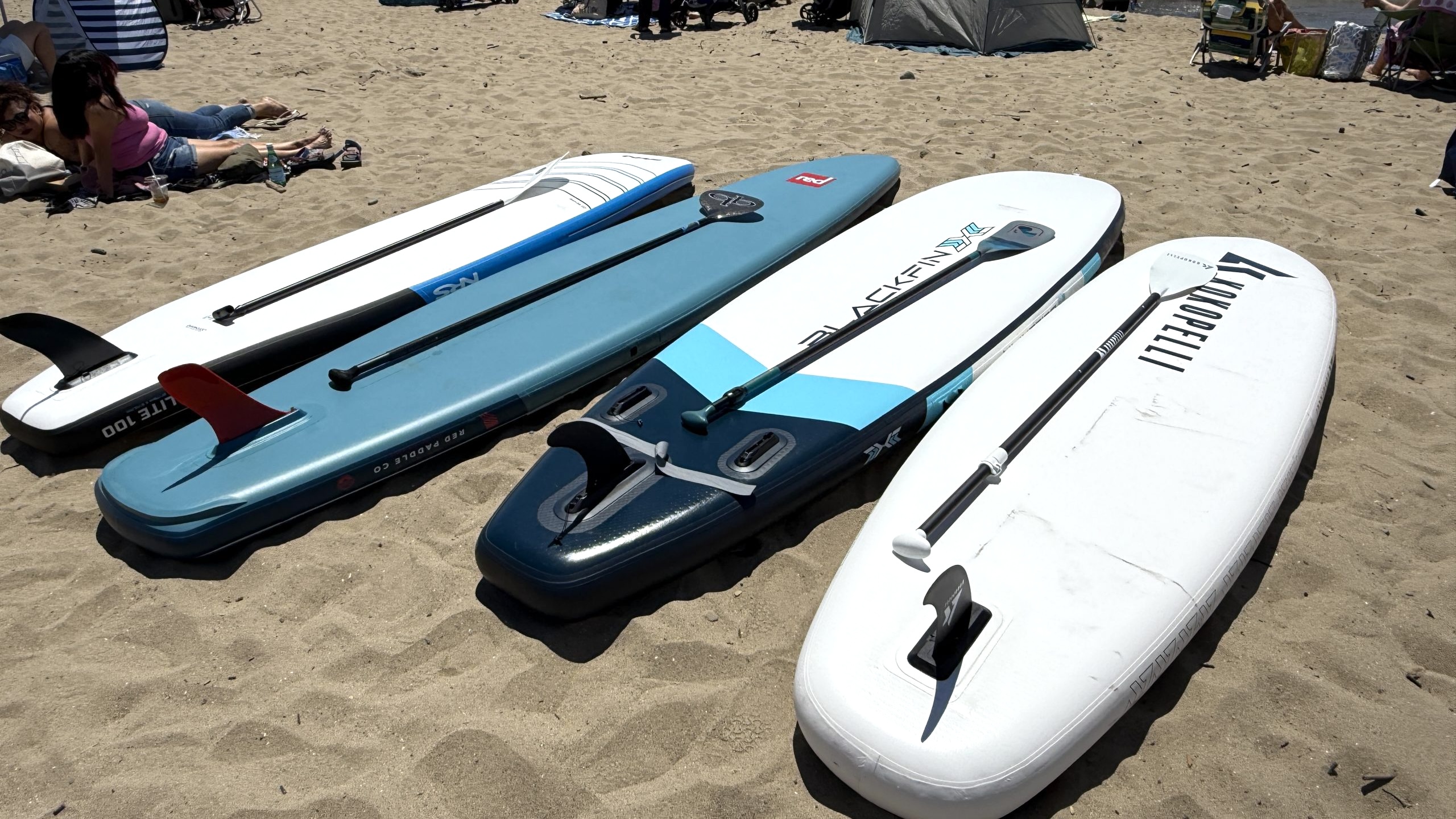 recently tested paddle boards on the sand