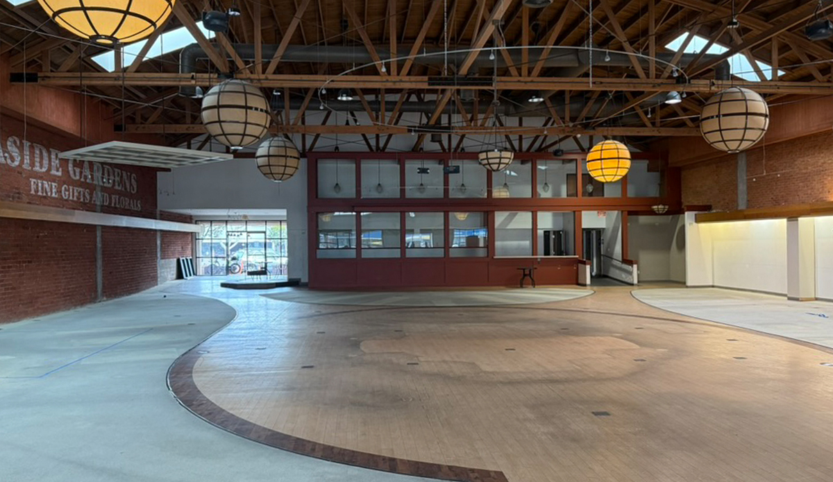 SHACC intends to preserve the architectural integrity of the space, including the exposed truss ceiling and brick walls. Photo: SHACC