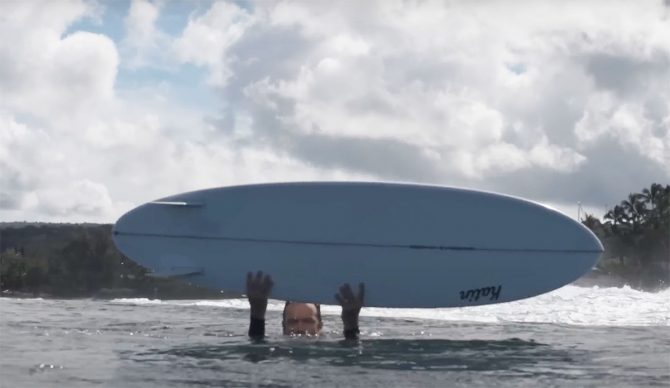 Devon Howard on mid-length surfboard