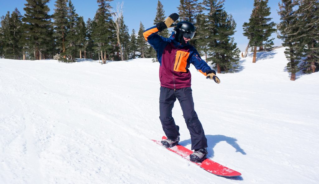 man snowboarding
