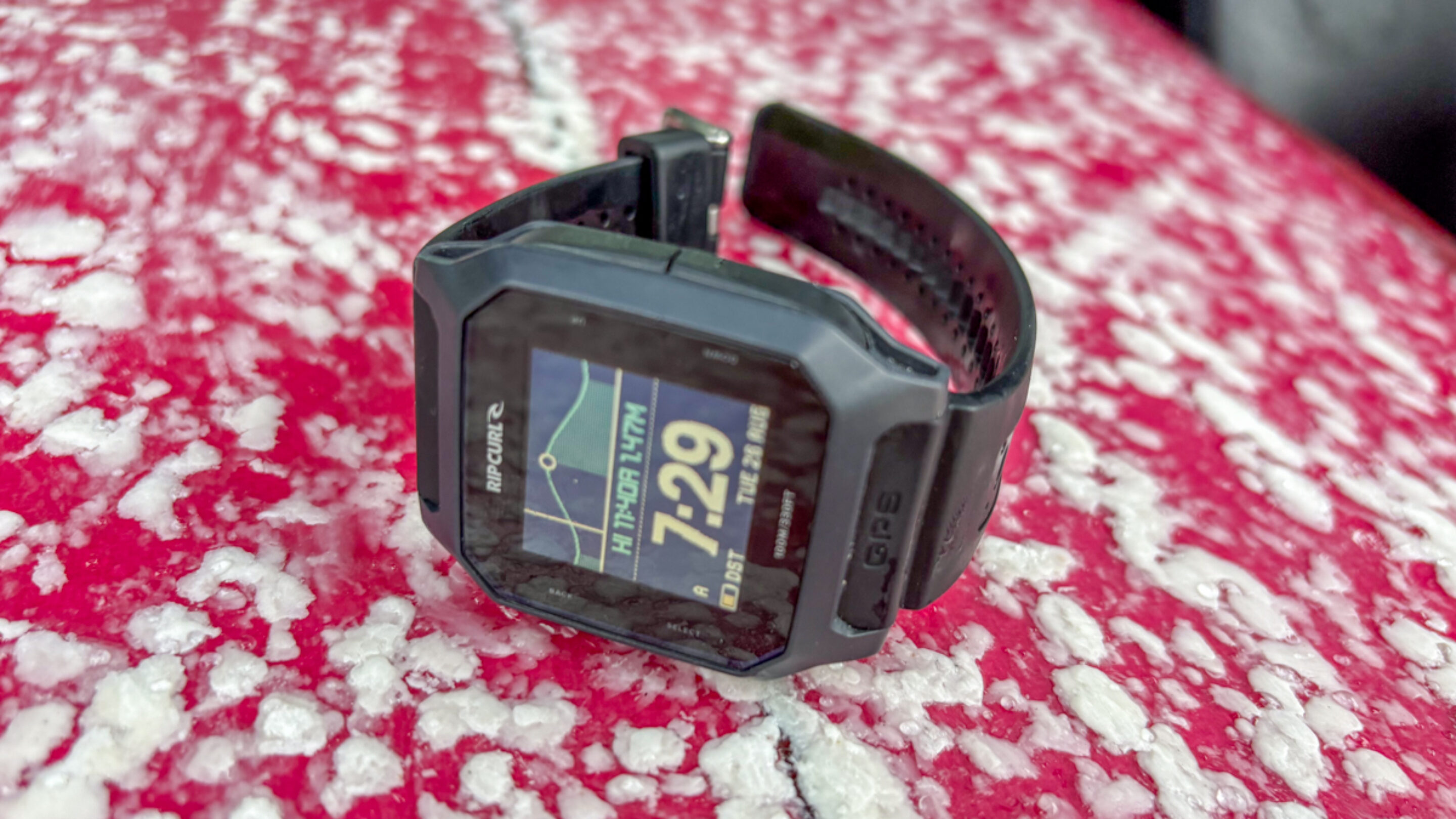 Rip Curl Search GPS3 surf watch on surfboard