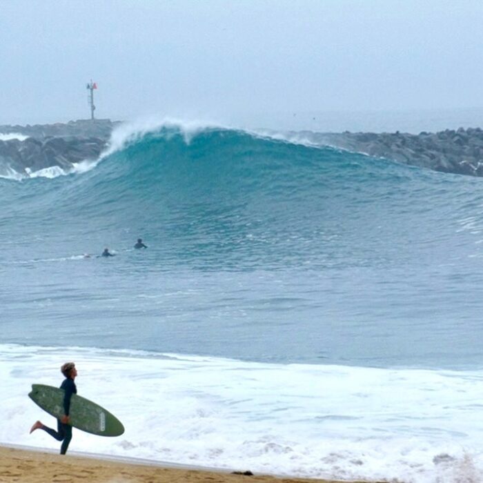 Hurricane Narda surfers at the Wedge in Newport Beach