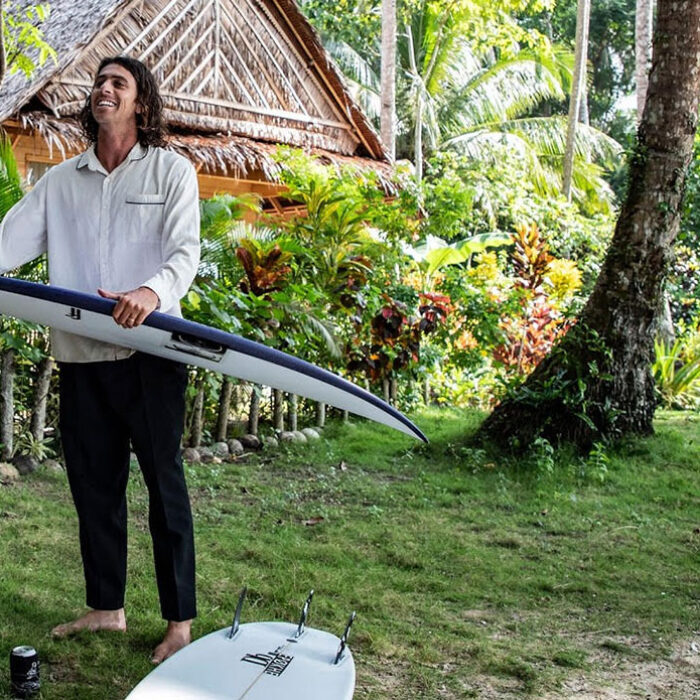Craig Anderson at Alaia Mentawai with surfboards