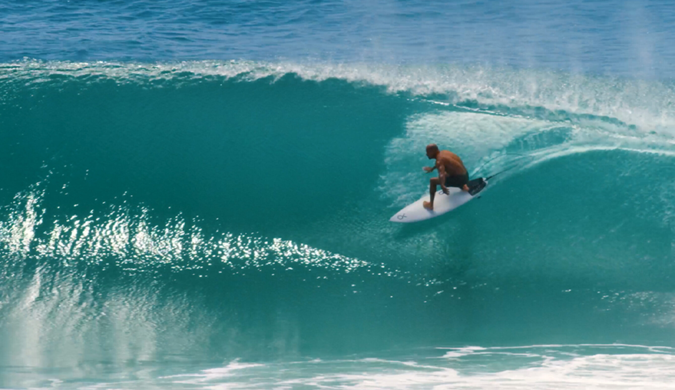 Kelly Slater surfing Firewire surfboard The Spaceship
