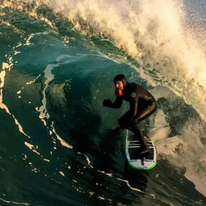 Ian Battrick surfing in a barrel