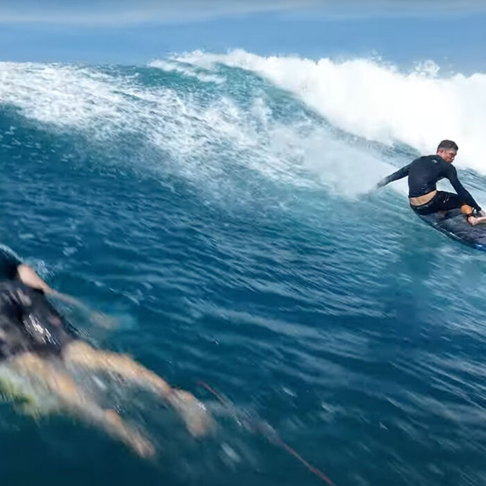 Cam Scott surfing on a finless surfboard in NoFINDO
