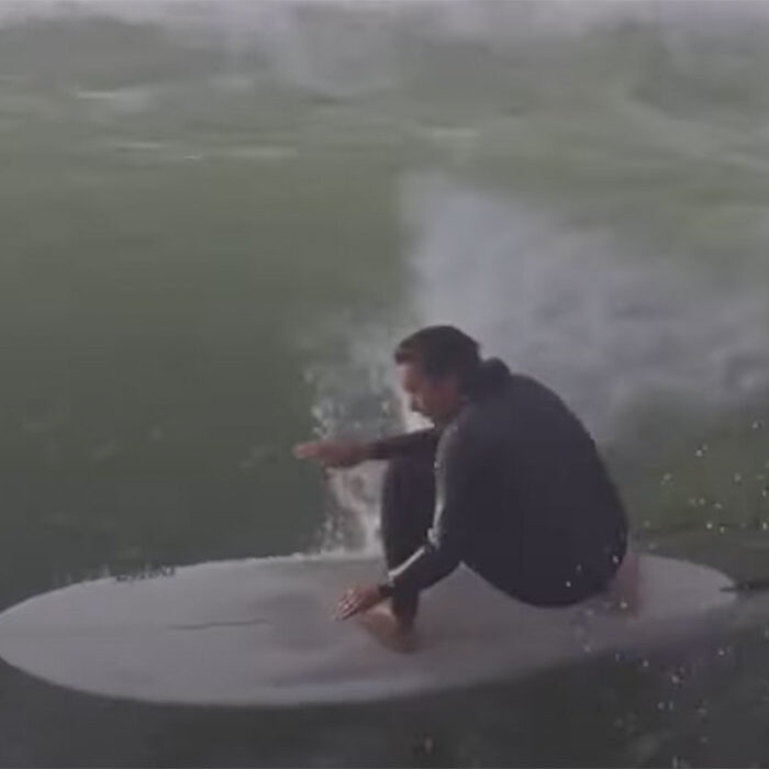 Devon Howard surfing a midlength surfboard