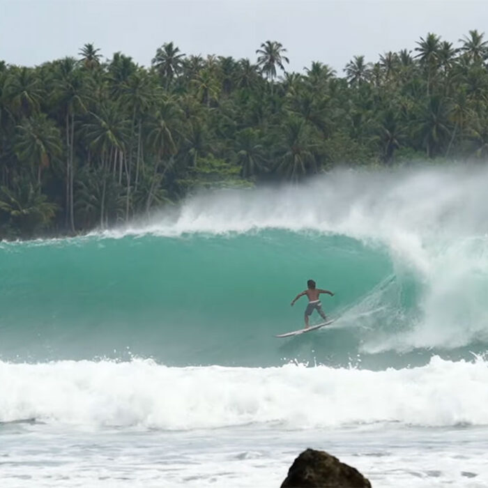 surfer riding the wave at Nias