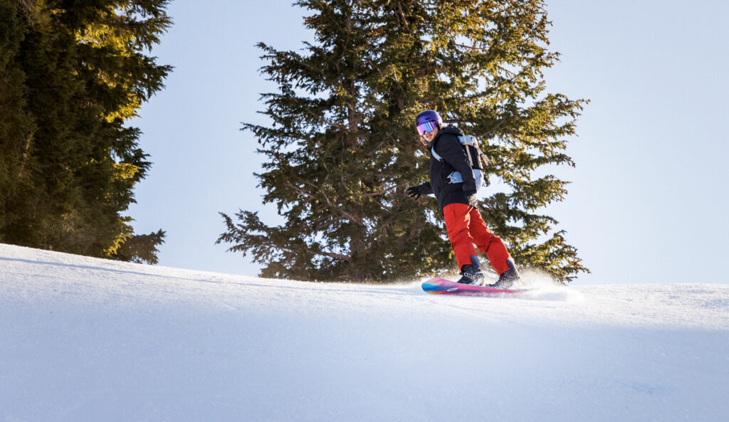 man snowboarding