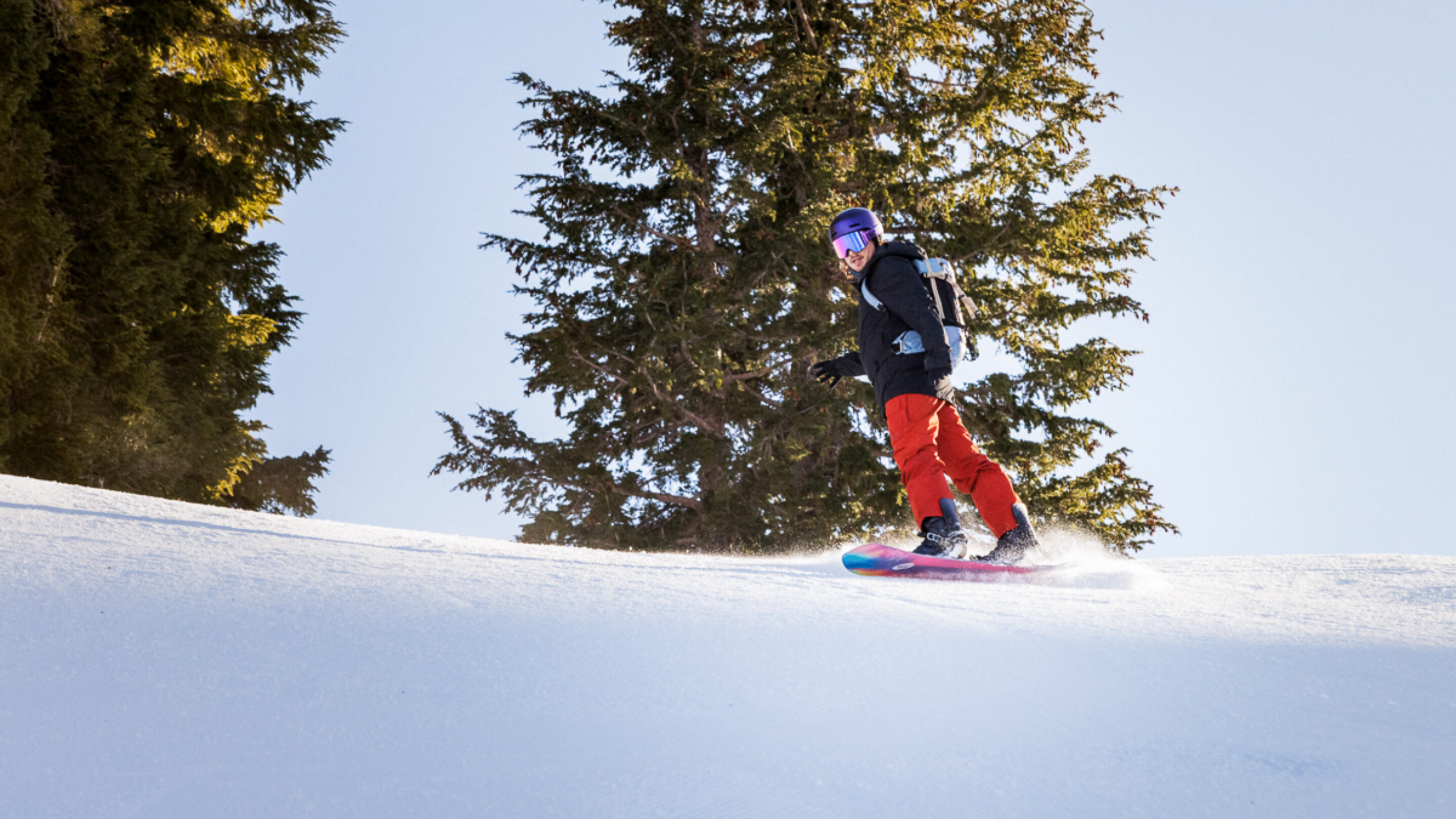man snowboarding