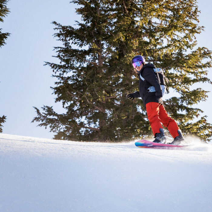 man snowboarding