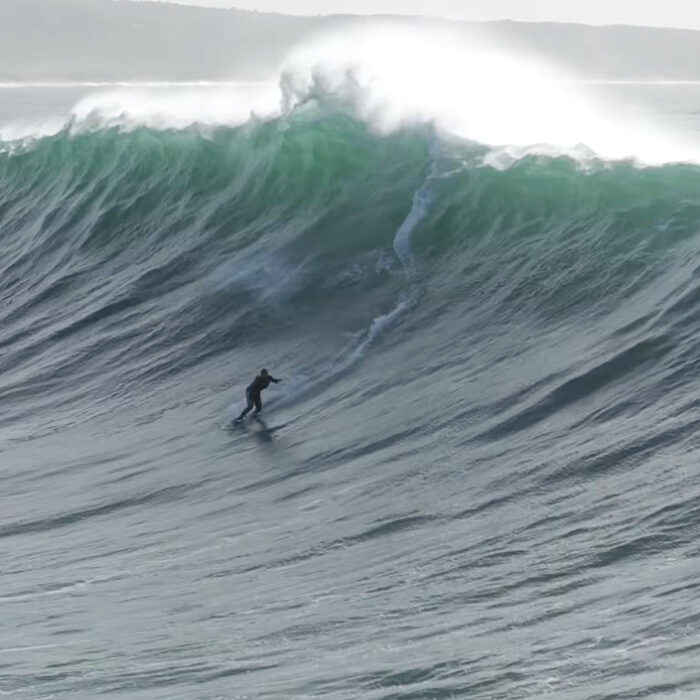 Lucas 'Chumbo' Chianca taking run at a wall of water. Photo: Tim Bonython // YouTube