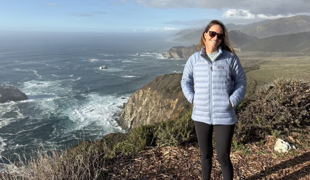 woman wearing the Patagonia Down Sweater
