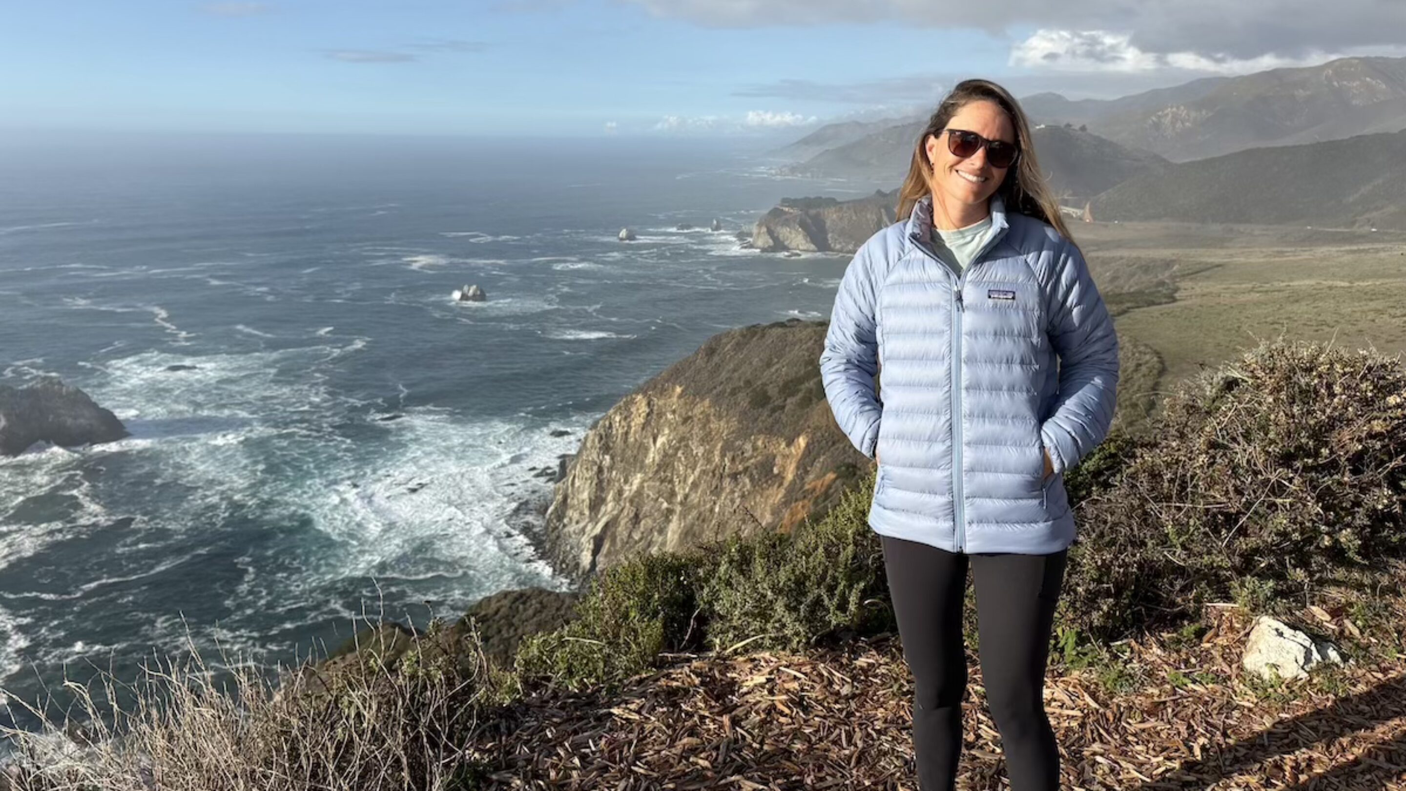 woman wearing the Patagonia Down Sweater