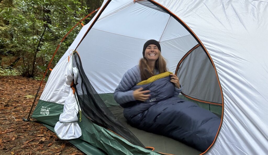 a woman in a sleeping bag