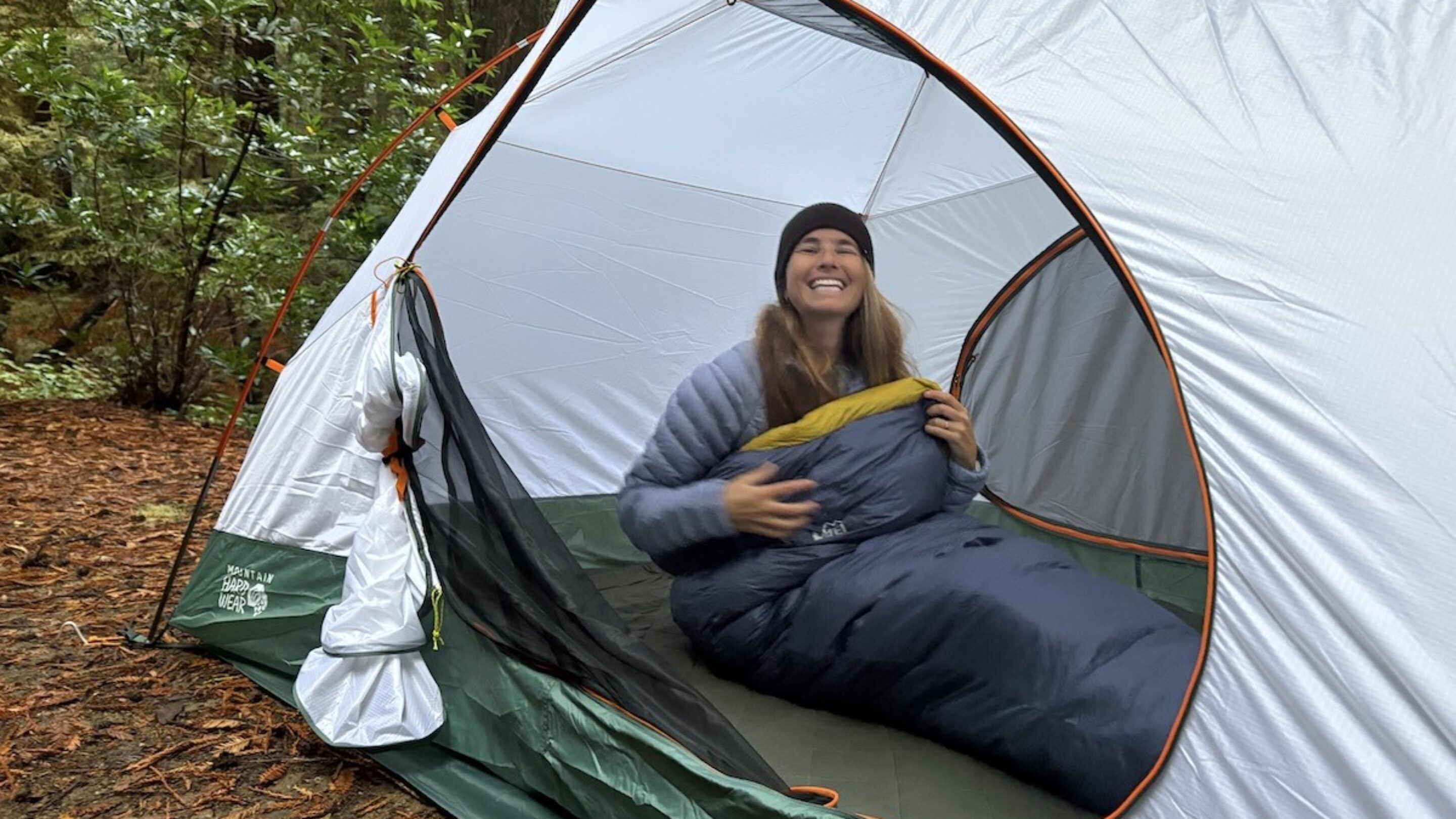 a woman in a sleeping bag