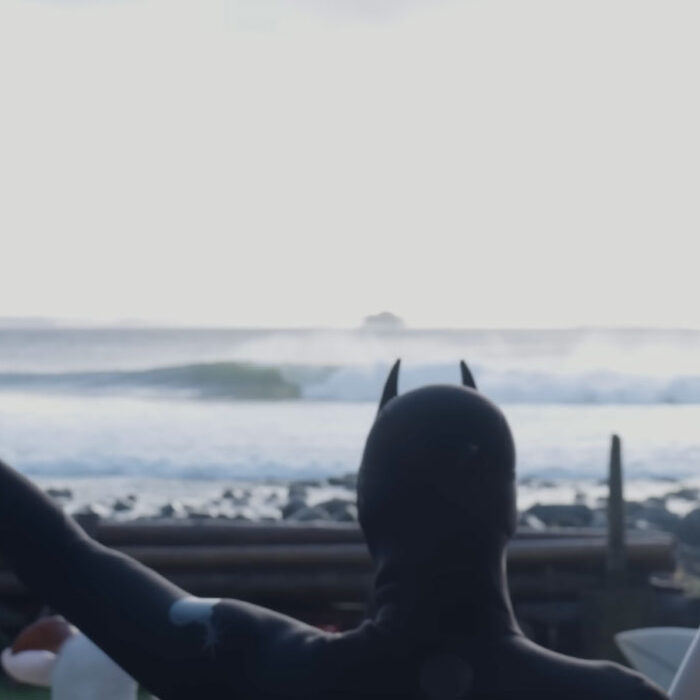 Reed Platenius watching a wave break on Vancouver Island