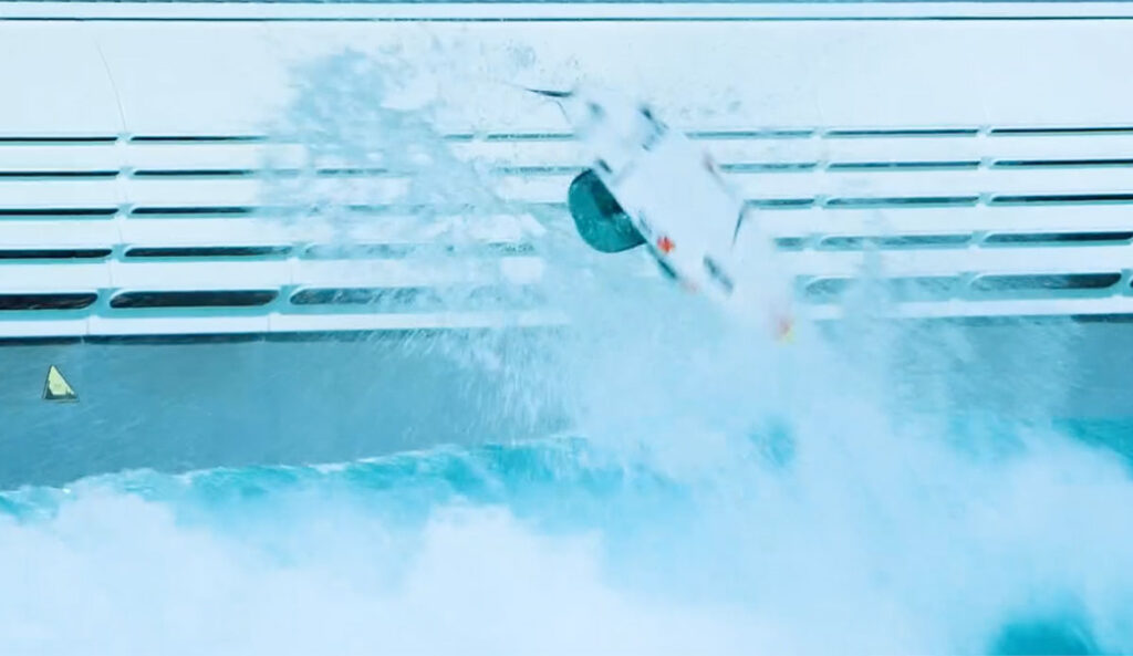 Sierra Kerr doing a backflip in a wave pool