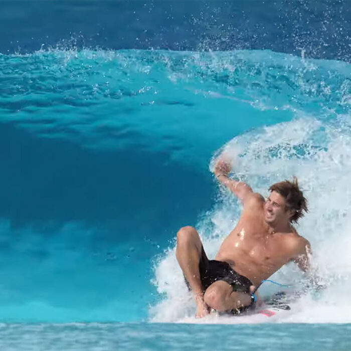 Clay Marzo surfing a backside barrel at the Wavegarden in Spain