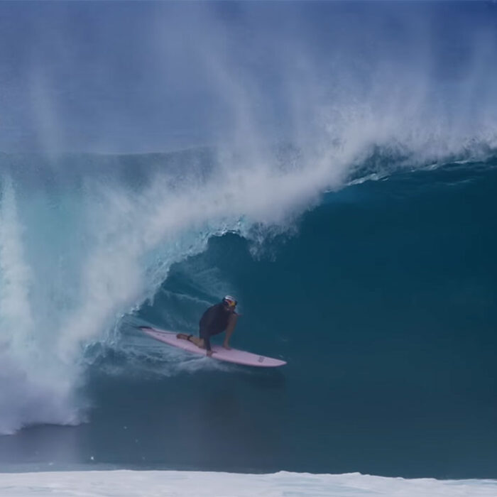 Jamie O'Brien surfing a Fun Day surfboard at Pipeline