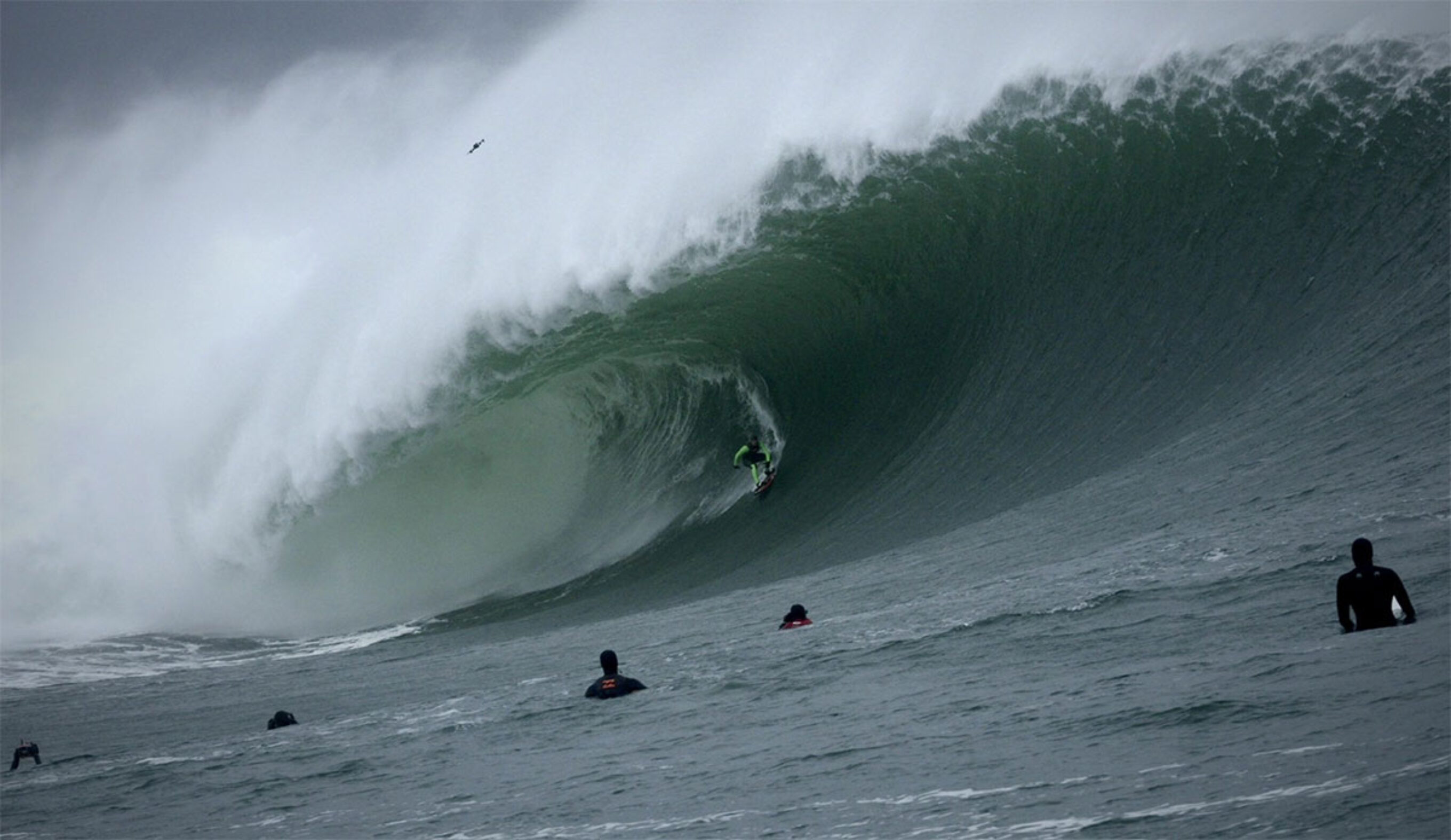 Surfer riding a wave at Mullaghmore in December