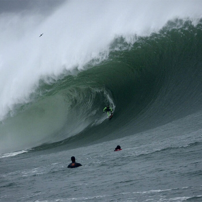 Surfer riding a wave at Mullaghmore in December