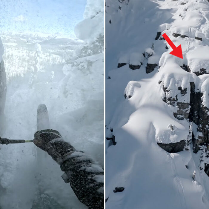 Parkin Costain skiing through a chimney in a mountain