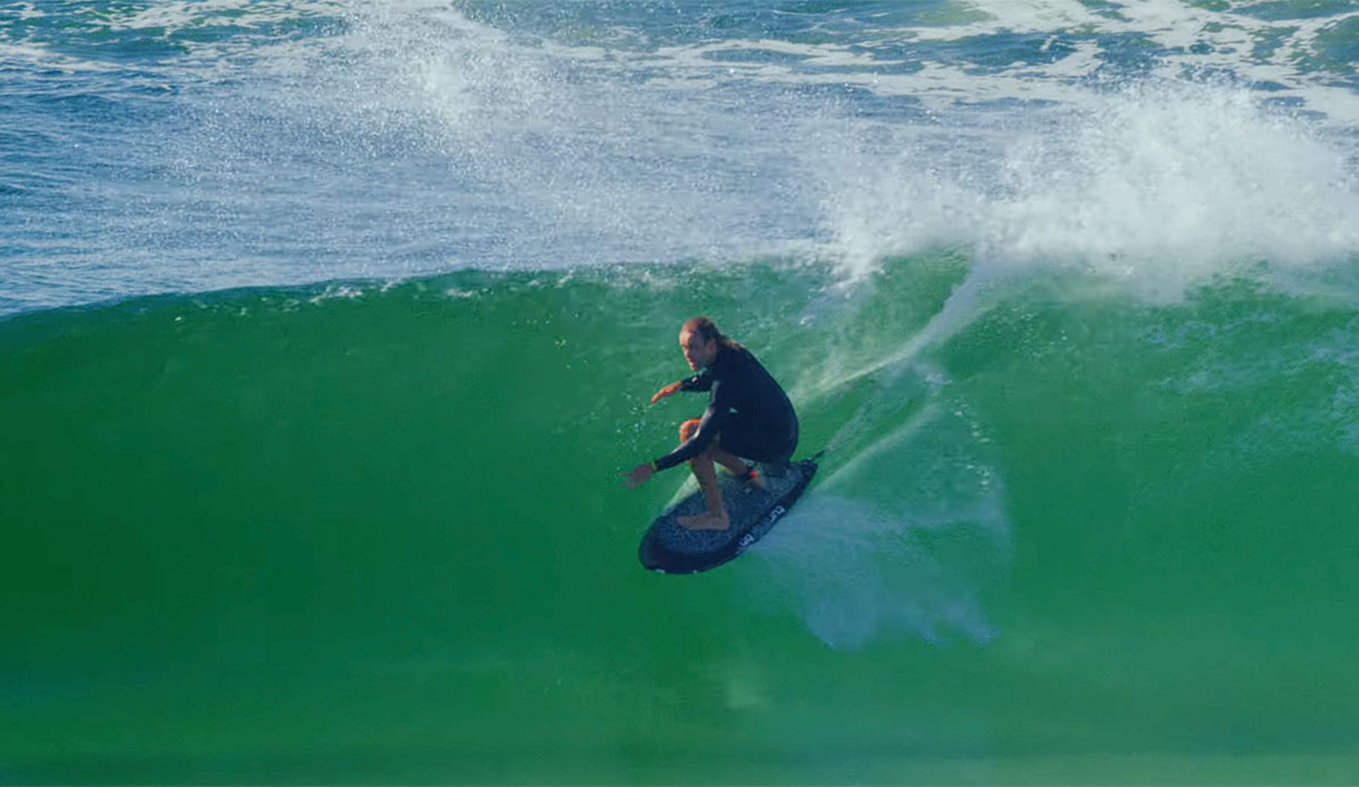 Ari Browne surfing a Lucid Fish surfboard