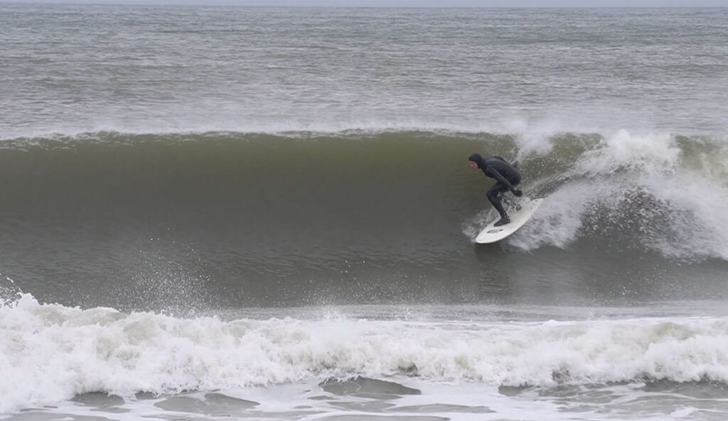 Ben Gravy surfing in New Jersey