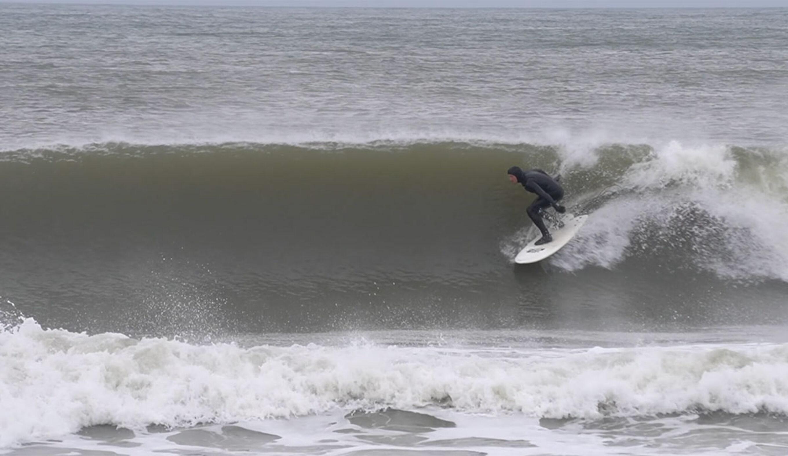 Ben Gravy surfing in New Jersey