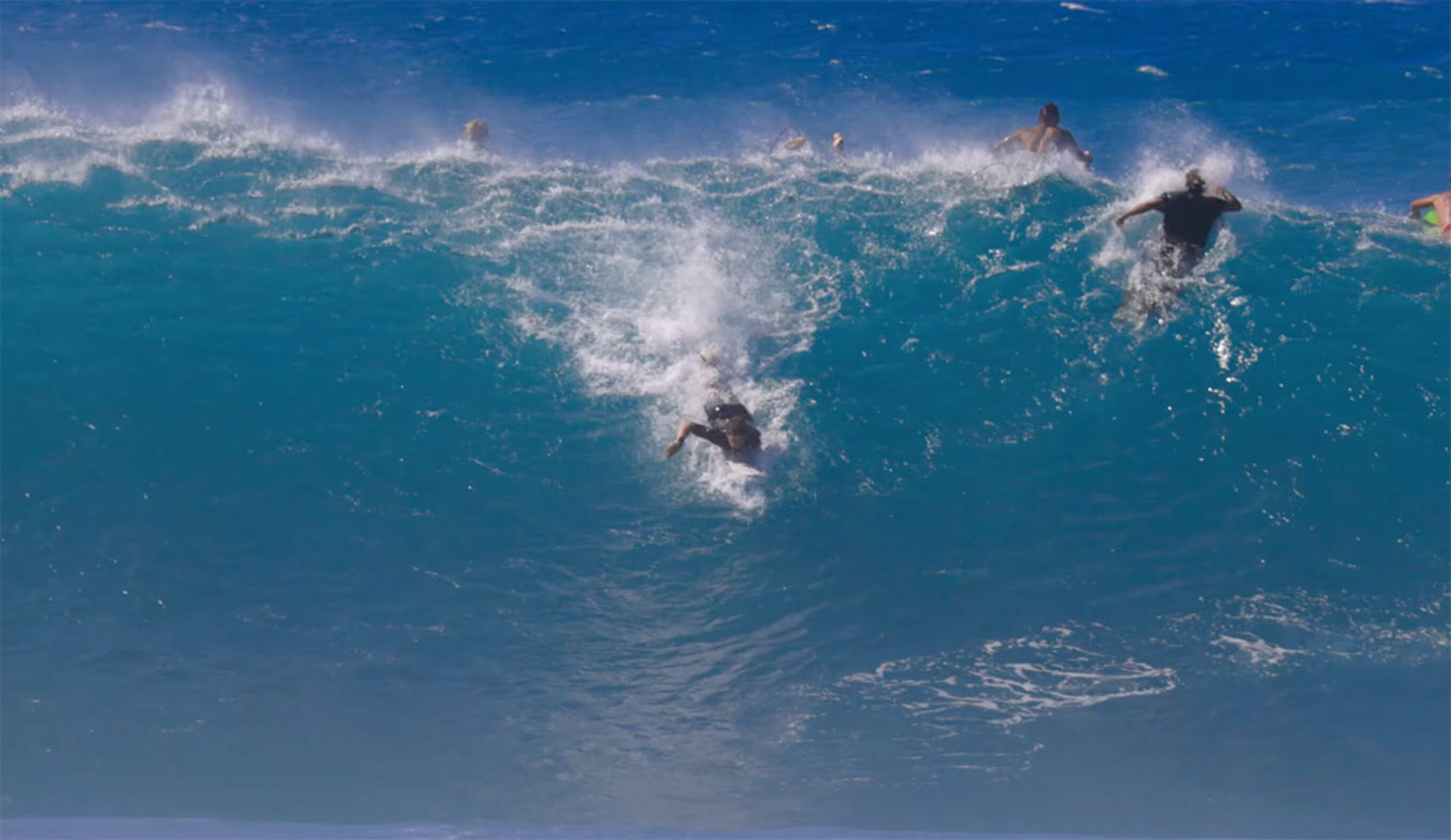 Nathan Florence paddling for a wave at Pipeline