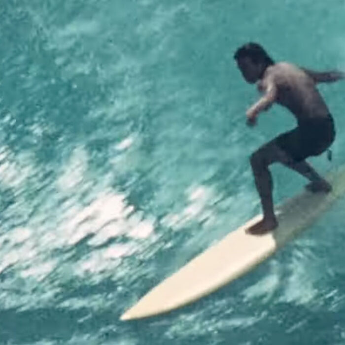 Hawaiian surfer riding a wave in 1974