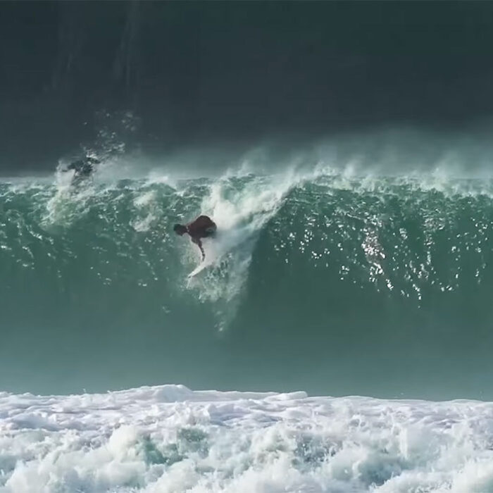 Matt Bromley paddling into a wave