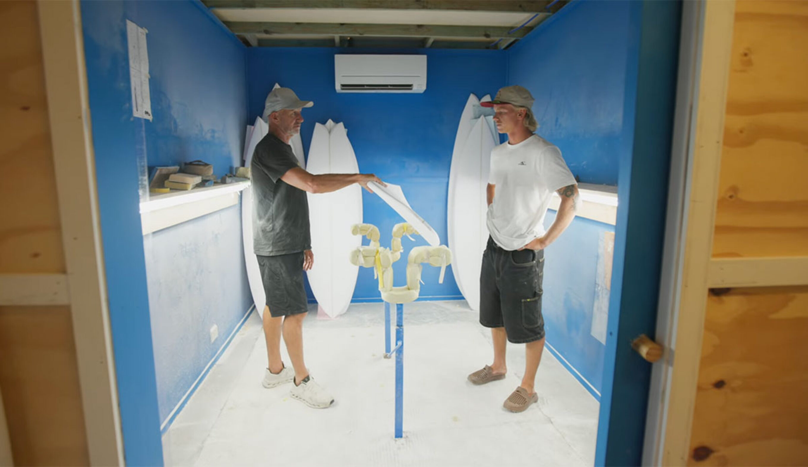 Darren Handley making a custom surfboard for Joel Vaughan